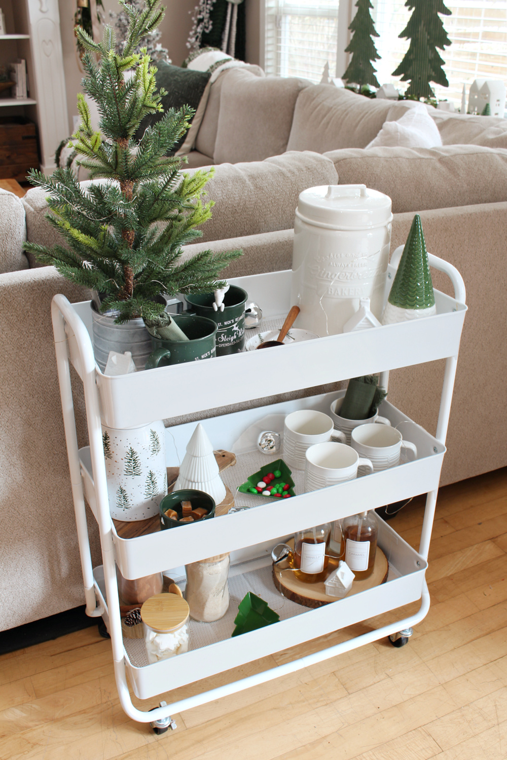 Hot chocolate bar cart decorated with green and white.